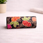 side view artisan batik sunglass case floral textile pattern
