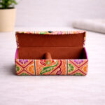 heritage print eyeglass case holding eyeglasses