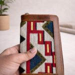close up of boho leather wallet textile fabric detail