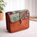 Side angle of Zardozi Sling Bag showing premium leather and embroidery